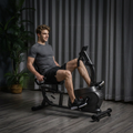 Seated cycling photo in gym clothes
